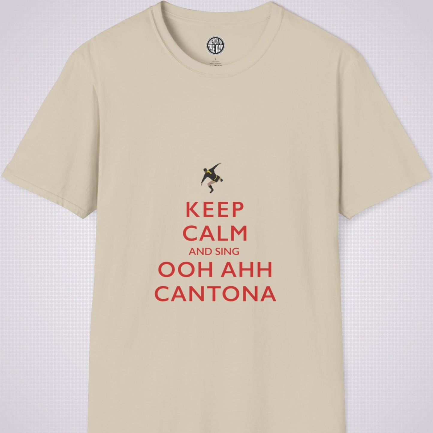 Sand T Shirt on a light grey dotted backdrop. The design on the shirt is done in the keep calm style which reads 'Keep Calm And Sing Ooh Ahh Cantona' in red text, with a cartoon graphic of Eric's famous kung fu kick above it.