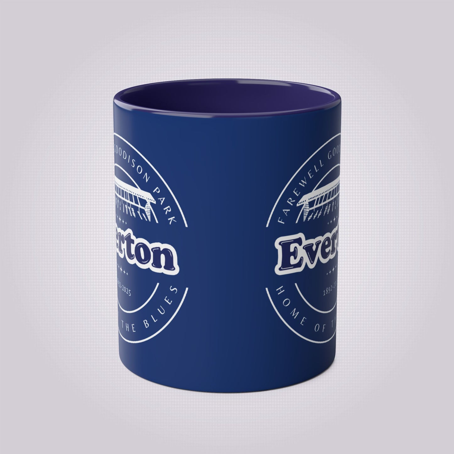 This shows the navy mug from the front side with the dark blue infill and the mug artwork on both sides