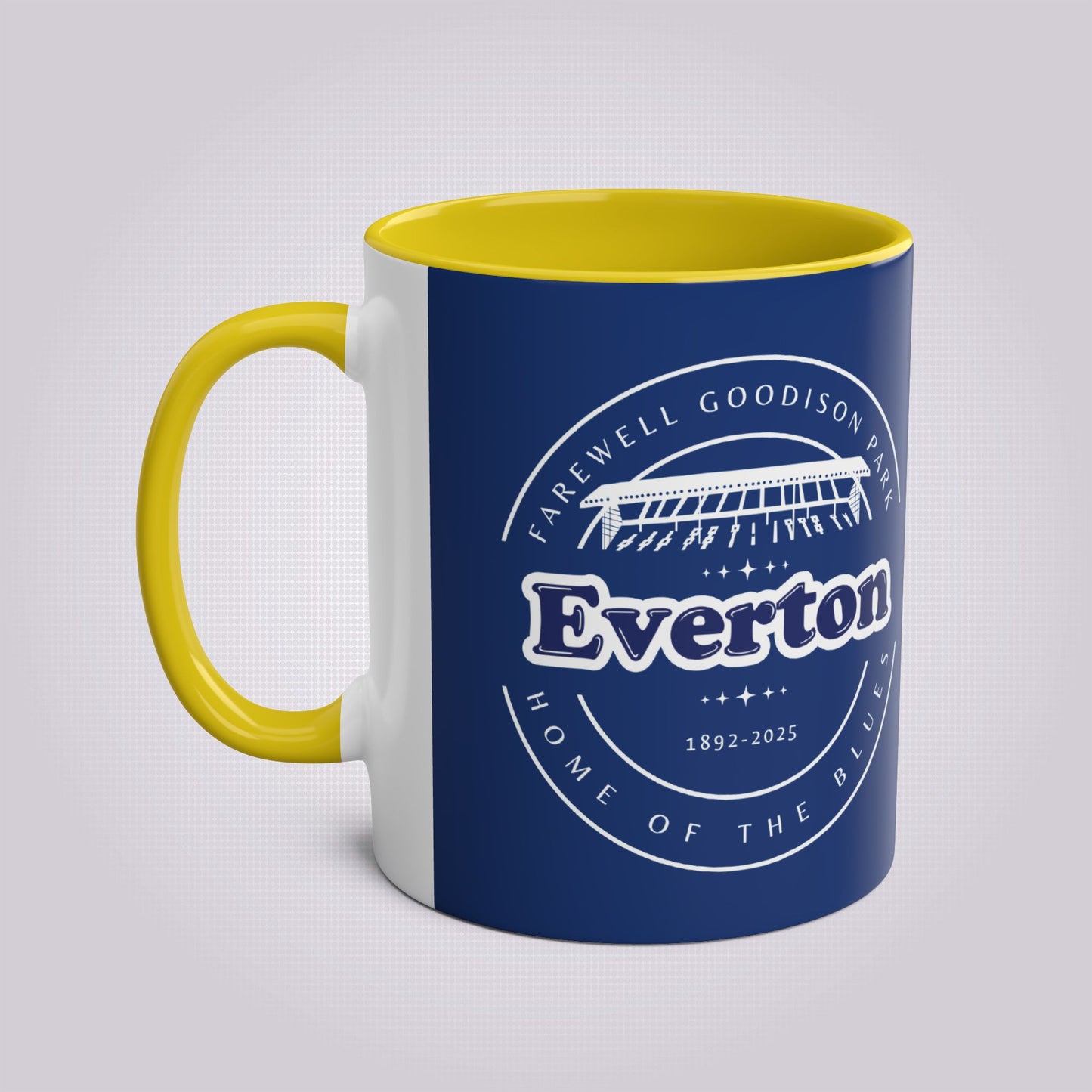 Shows the yellow handle and infill colour with the handle on the left the mug colour is in navy with the graphic of goodison park and the words around it written in white, the words read 'Farewell Goodison Park Everton Home of the blues 1892 - 2025'.