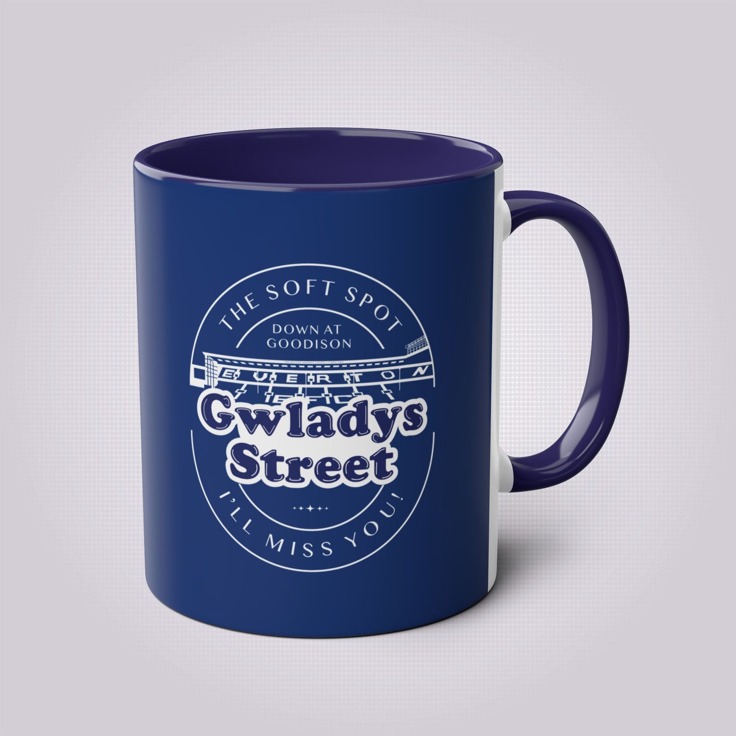 Navy Blue mug with dark blue handle and inners the artwork on the front shows a graphic of the famous Gwladys Street End with the words 'The Soft Spot down at Goodison Gwladys Street I'll Miss You!'