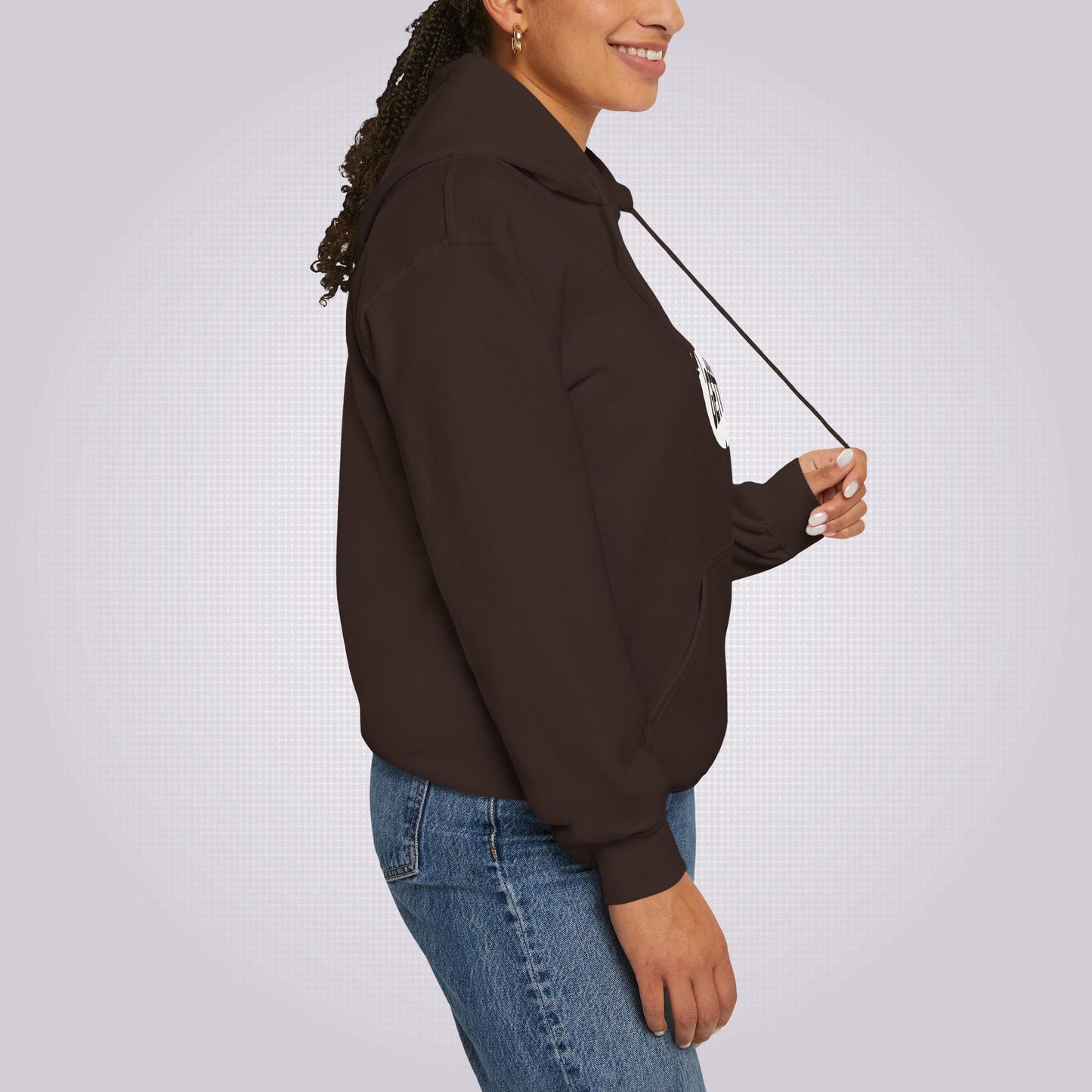 Side profile of a woman she is facing to the right as you look and she is pulling at the drawstring demonstrating the length
