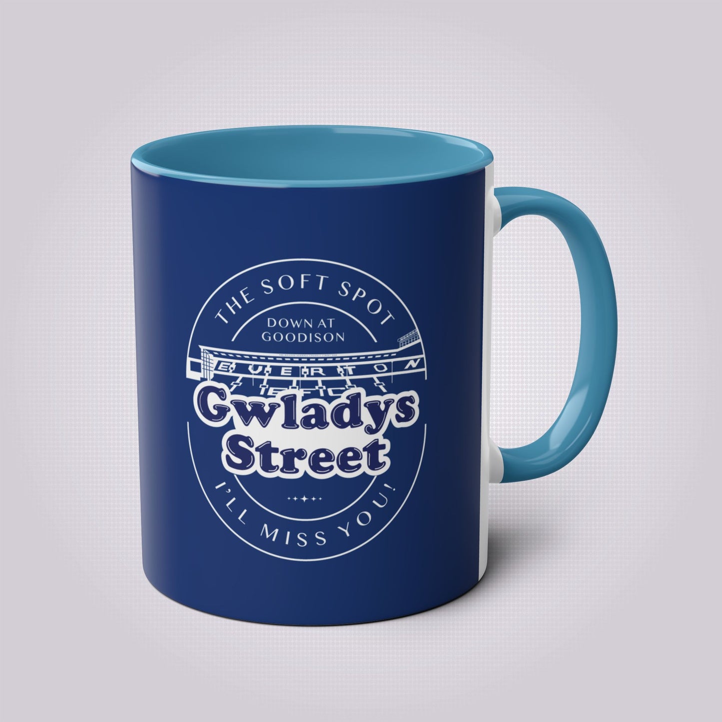 Navy Blue mug with light blue handle and inners the artwork on the front shows a graphic of the famous Gwladys Street End with the words 'The Soft Spot down at Goodison Gwladys Street I'll Miss You!'