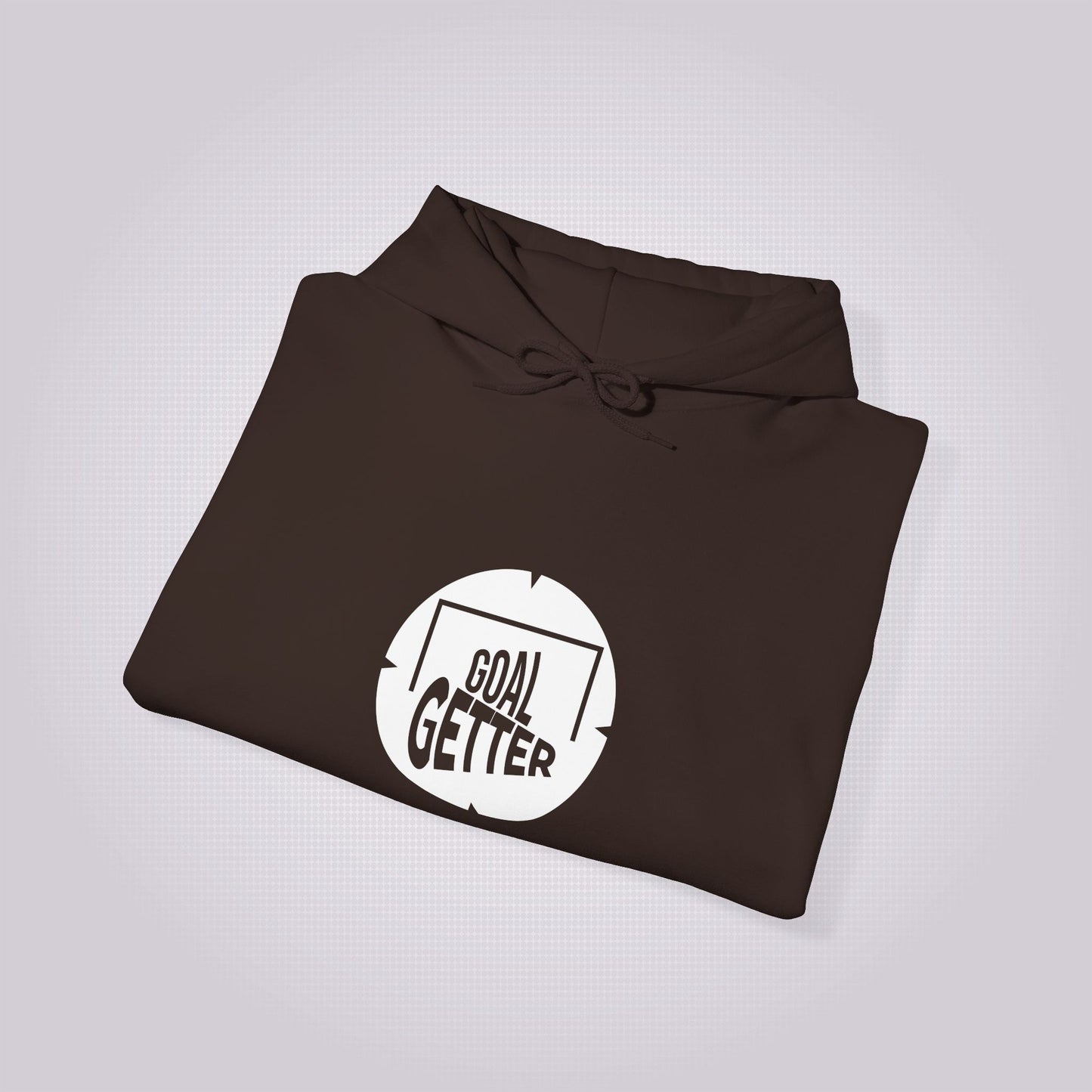 Brown hoodie folded and placed at a slight right angle