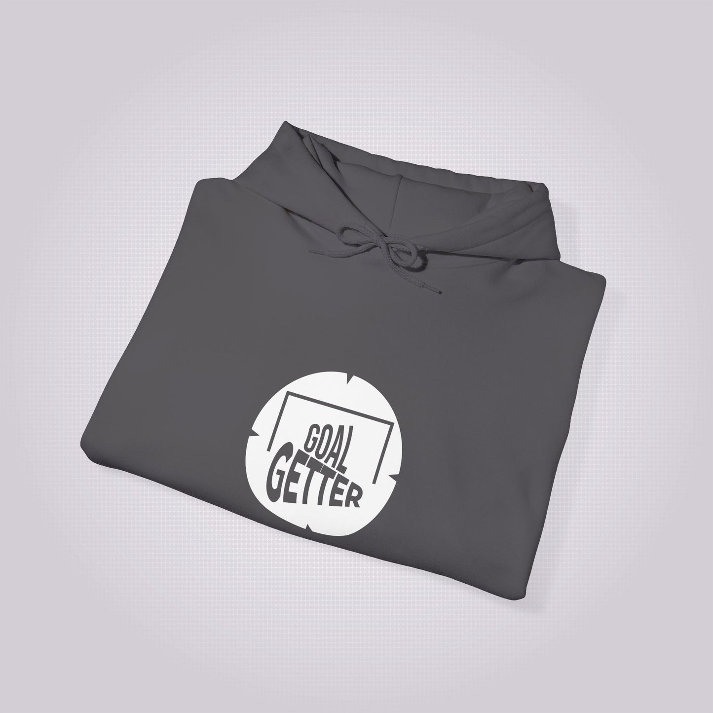 Charcoal hoodie folded up and placed at a slight right angle