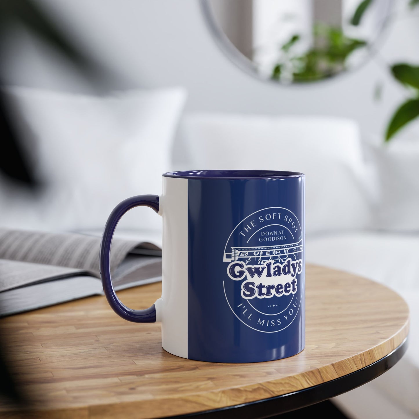 Lifestyle image shows the Navy blue and dark blue mug in a living room environment