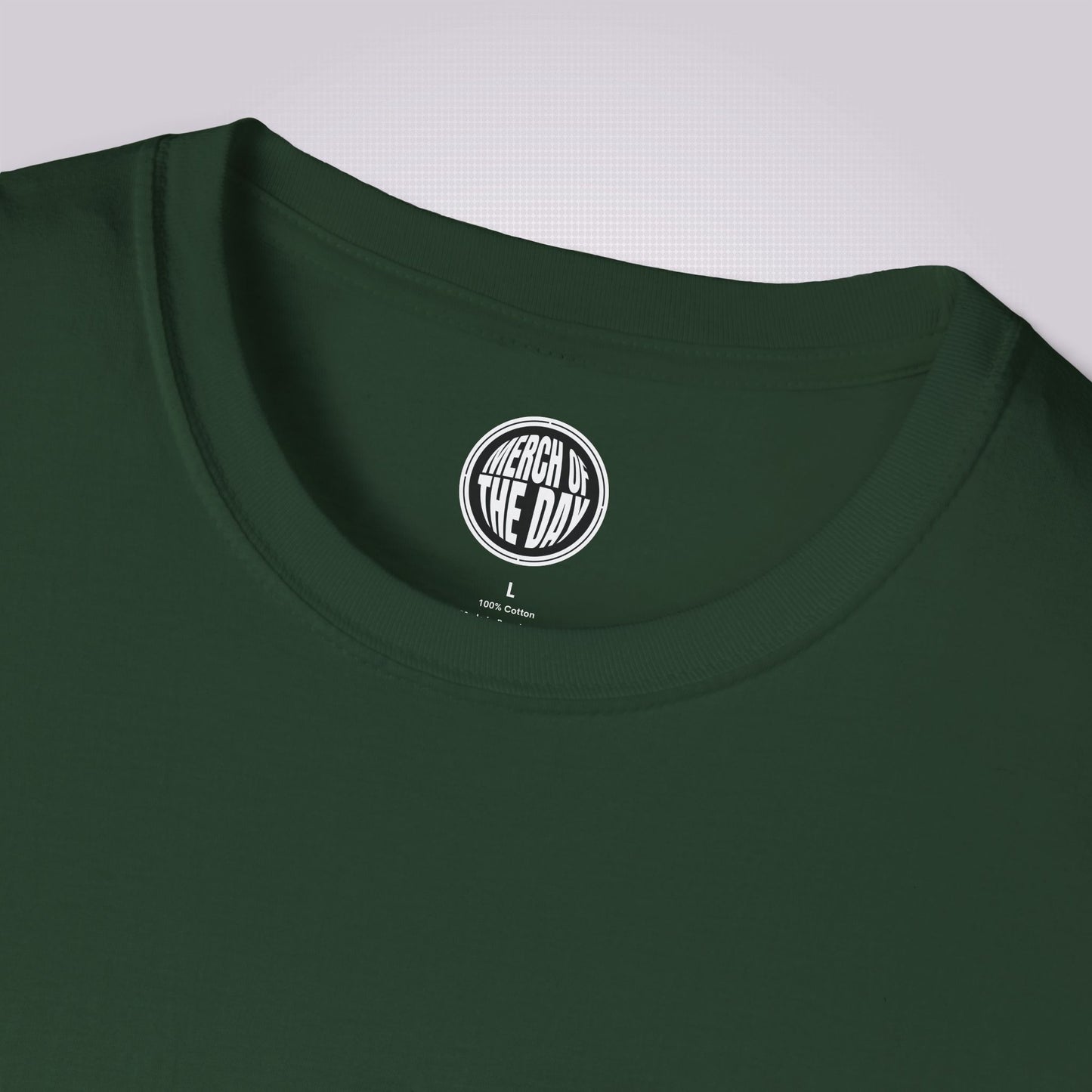 close up of green t shirt shows the crew neckline and clothing brand logo on the inner neck label