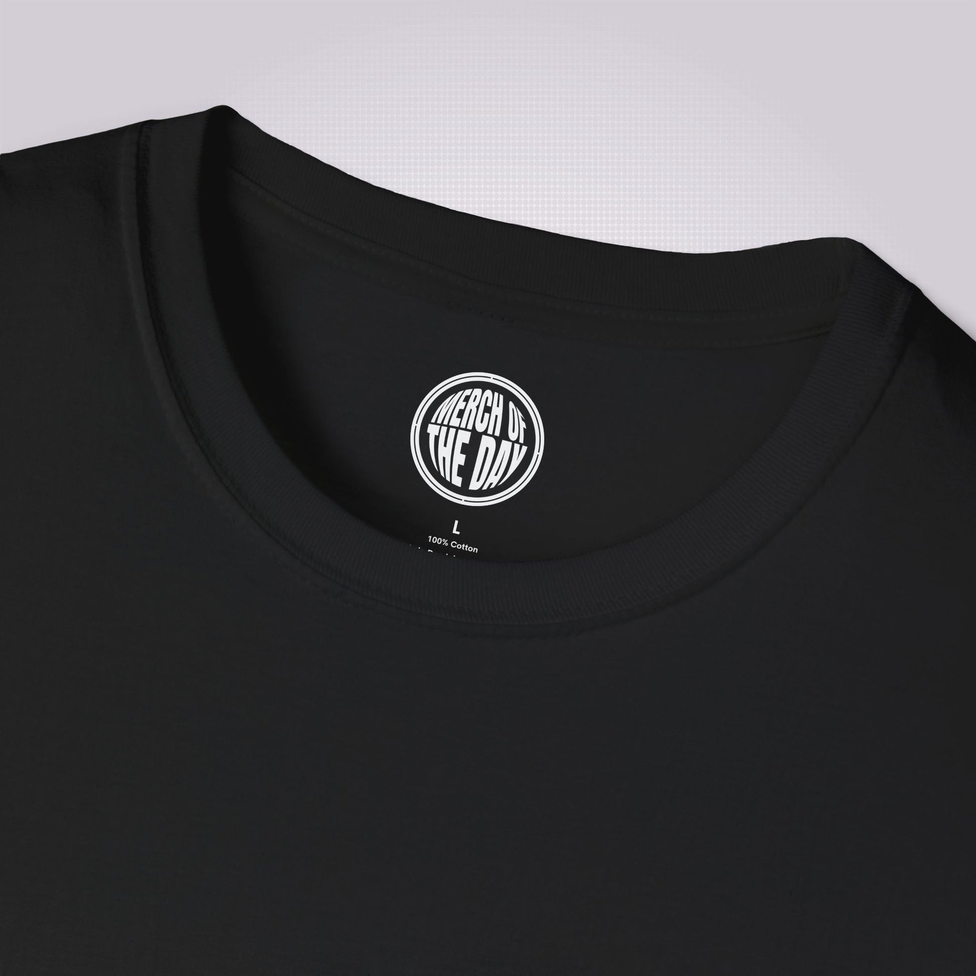 Close up of the black t shirt which shows the crew neckline and clothing brand logo on the inner neck label