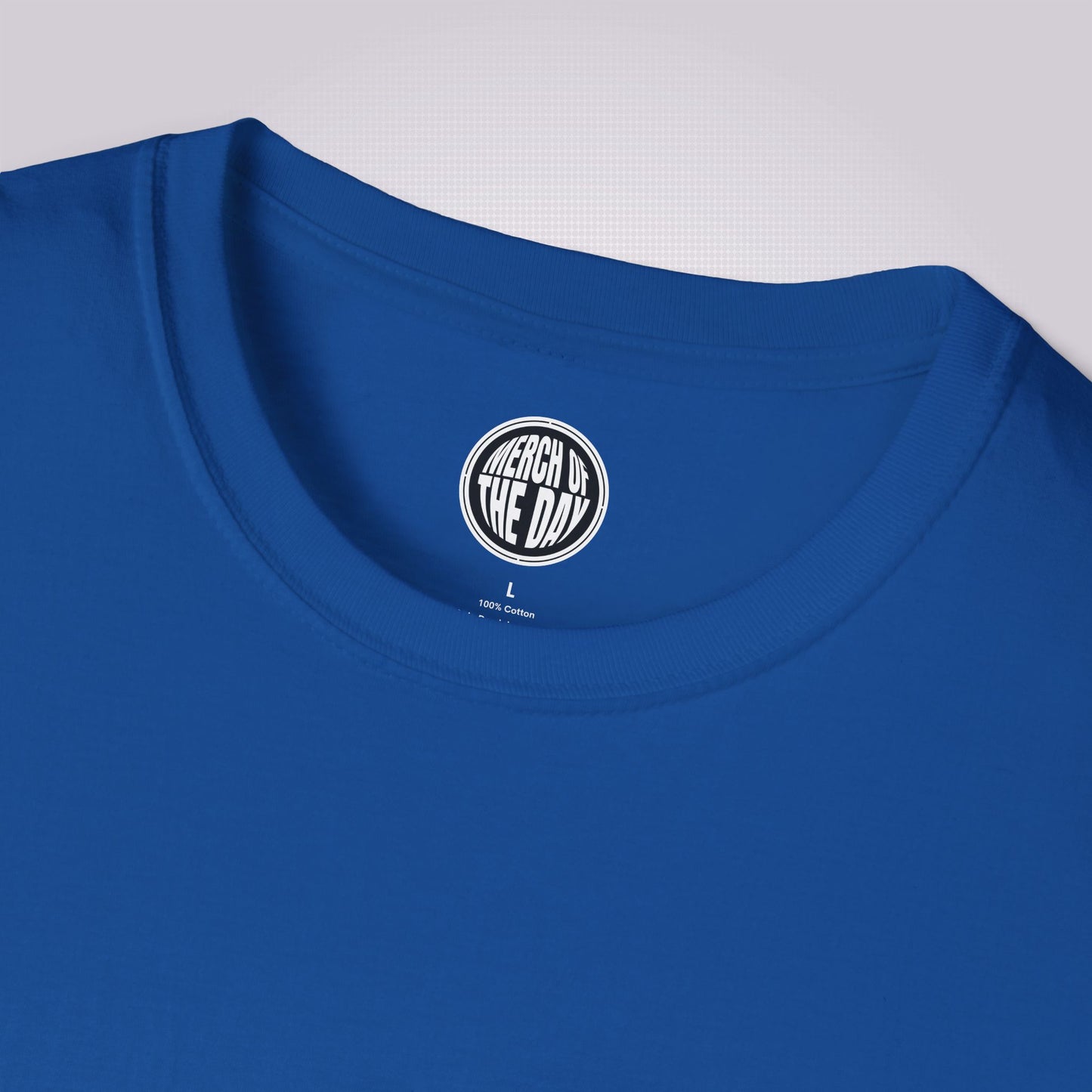 Close up of the Royal Blue t shirt which shows the crew neckline and clothing brand logo on the inner neck label