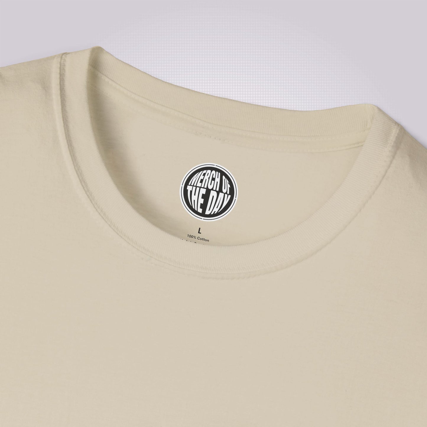 Close up of sand variant showing the crew neckline and clothing brand logo on the inner neck label