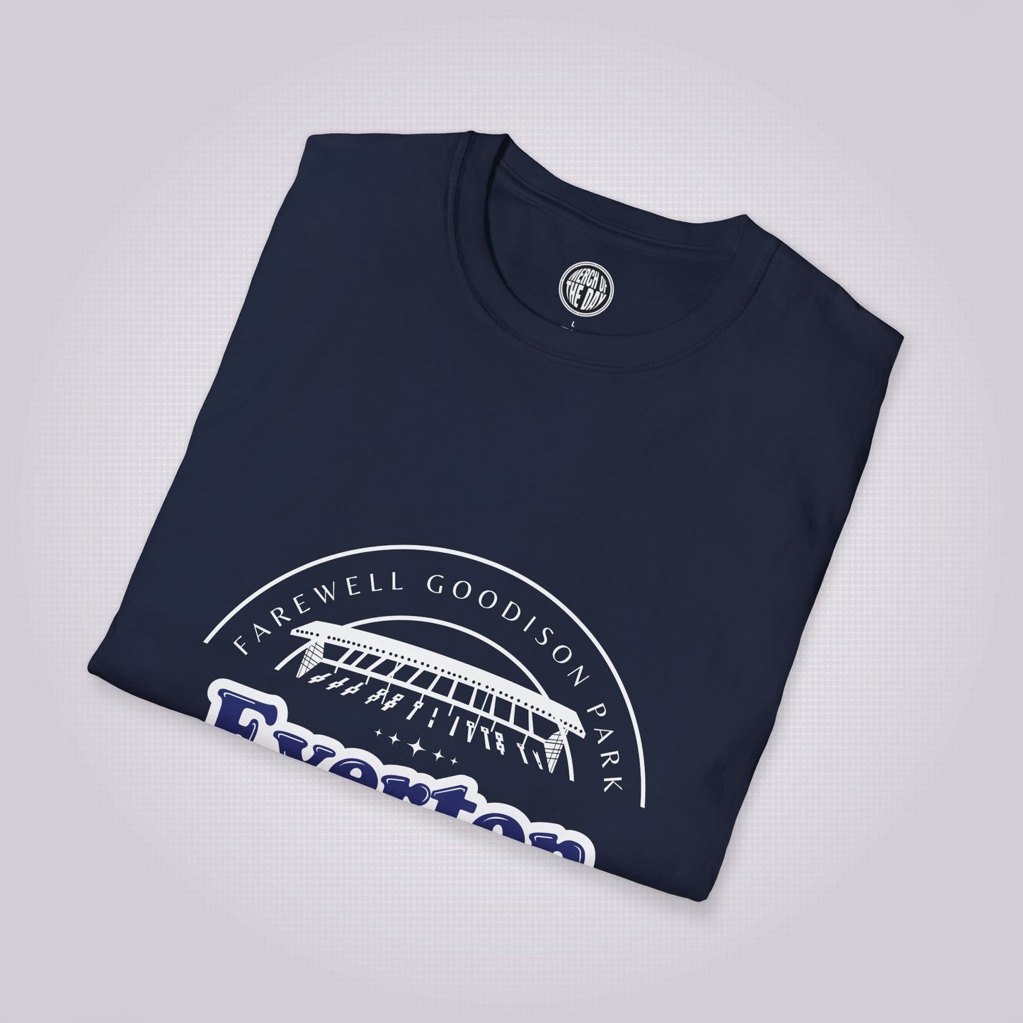 Navy t shirt placed at a slight right angle on a light grey dotted background