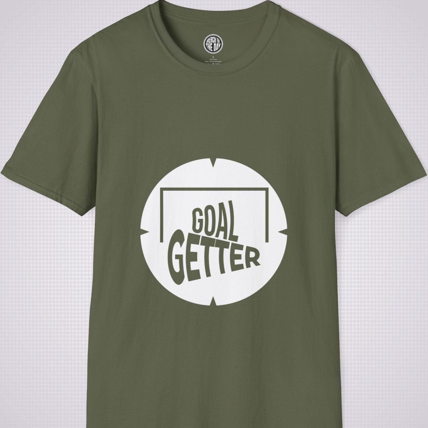 Military Green t shirt on a light grey patterned background the artwork on the shirt shows a circle with segments in all 4 corners symbolising a target and a football  and the words read goal getter within a goal frame 