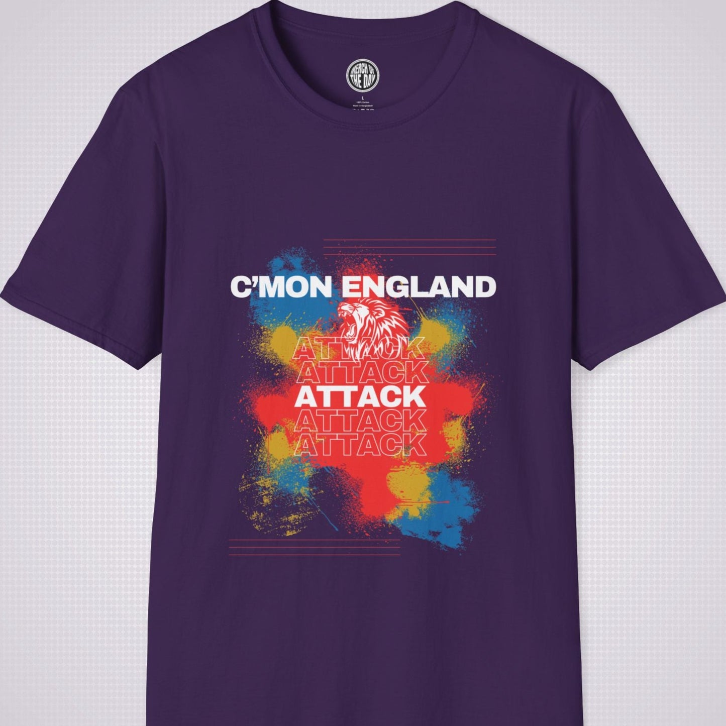 Purple t shirt on a light grey background with an explosion of red yellow and blue with a white lion roaring and the words cmon england attack 