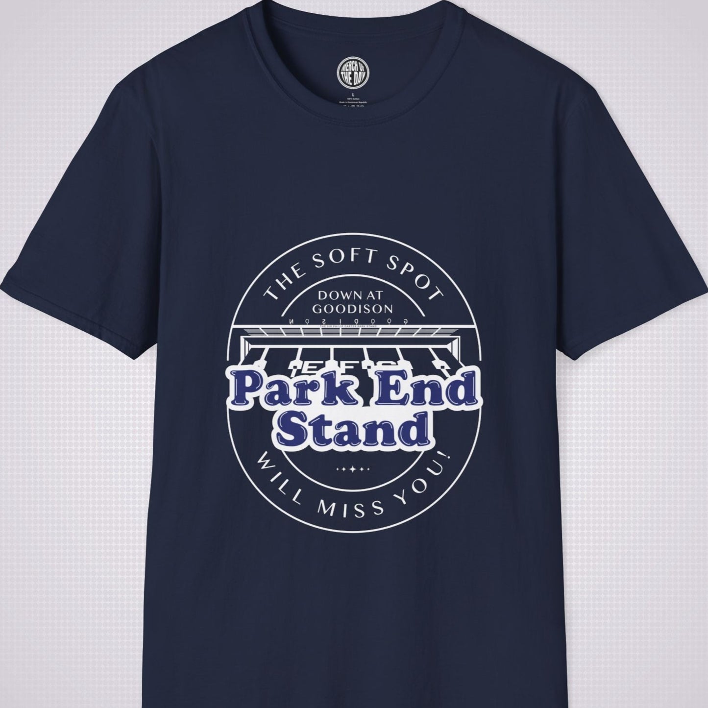 Navy T Shirt on a light grey dotted background. There is an illustration of the Park End Stand at Goodison Park. Above the illustration it reads 'The Soft Spot' in a downward facing arc with the words 'Down At Goodison' underneath that. Below the illustration it reads 'Park End Stand' in navy blue writing with a white fill behind it to make it stand out, underneath that it reads 'Will Miss You' in an upward facing arc.