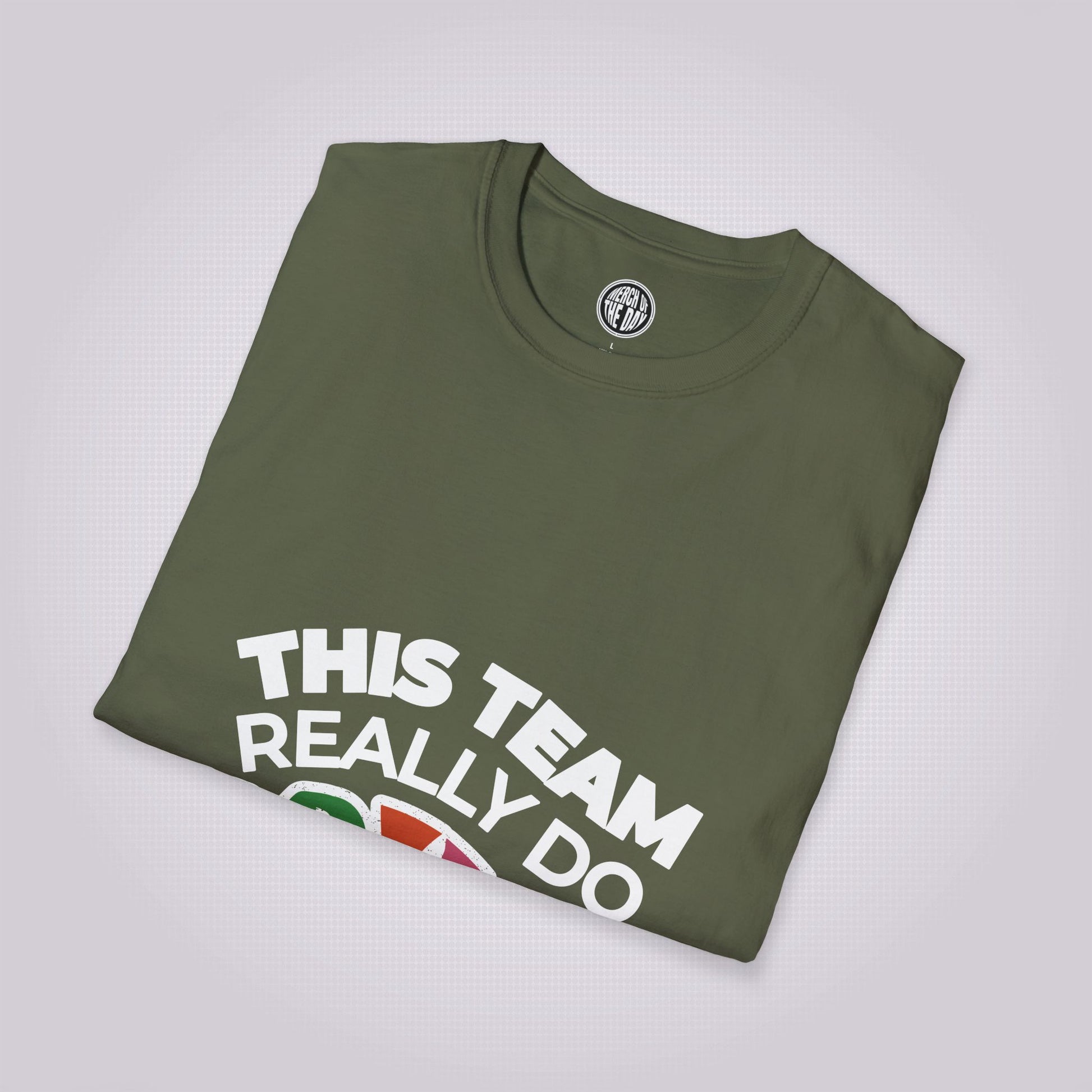 Military Green t shirt placed at a slight right angle on a light grey dotted background