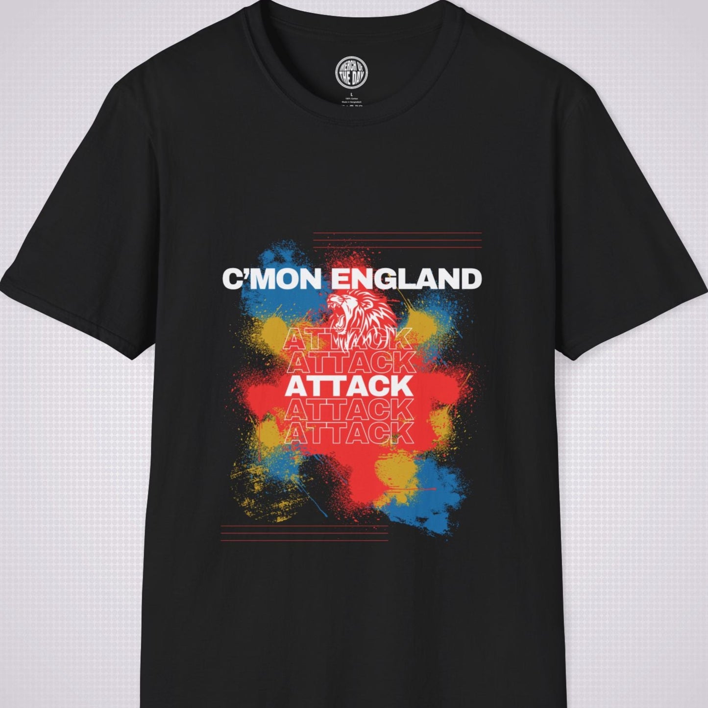 Black t shirt on a light grey background with an explosion of red yellow and blue with a white lion roaring and the words cmon england attack 