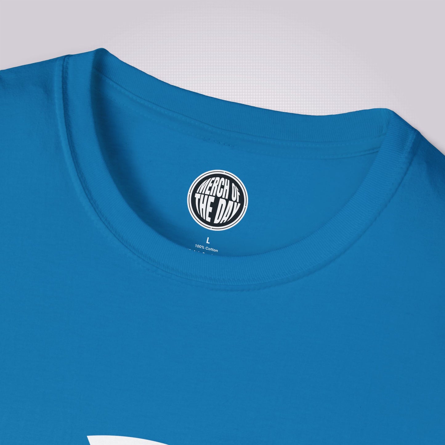 Close up of Sapphire Blue t shirt showing the crew neckline and clothing brand logo on the inner label