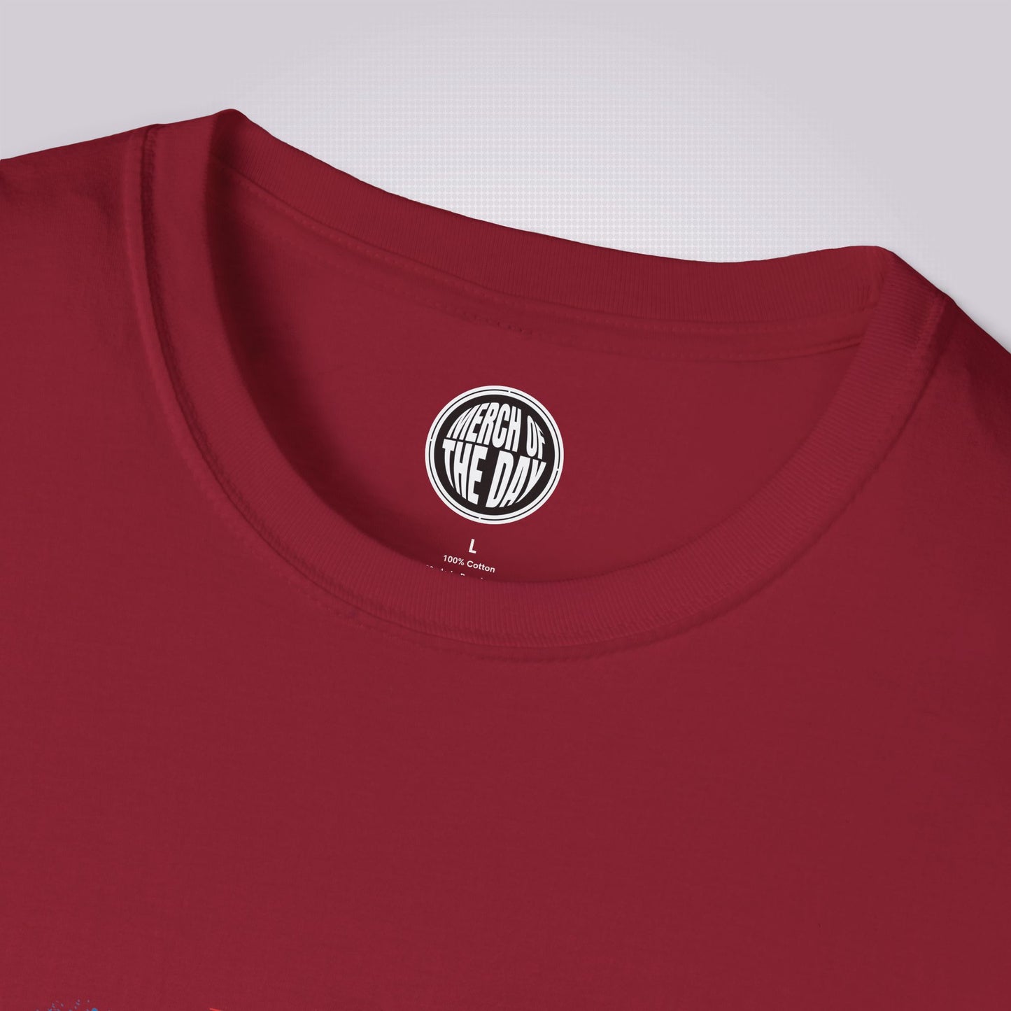 close up of red t shirt showing the crew neckline and clothing brand logo in the inner label