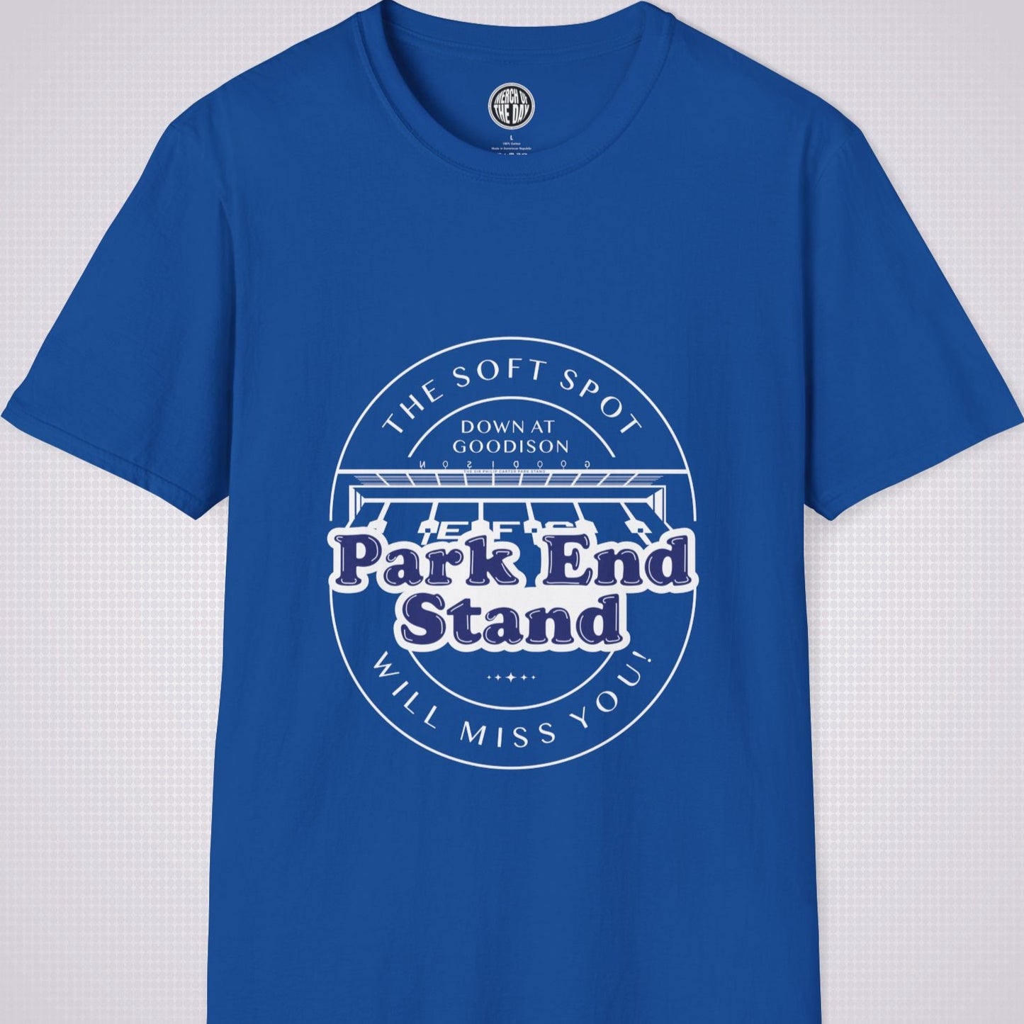 Royal Blue T Shirt on a light grey dotted background. There is an illustration of the Park End Stand at Goodison Park. Above the illustration it reads 'The Soft Spot' in a downward facing arc with the words 'Down At Goodison' underneath that. Below the illustration it reads 'Park End Stand' in navy blue writing with a white fill behind it to make it stand out, underneath that it reads 'Will Miss You' in an upward facing arc.