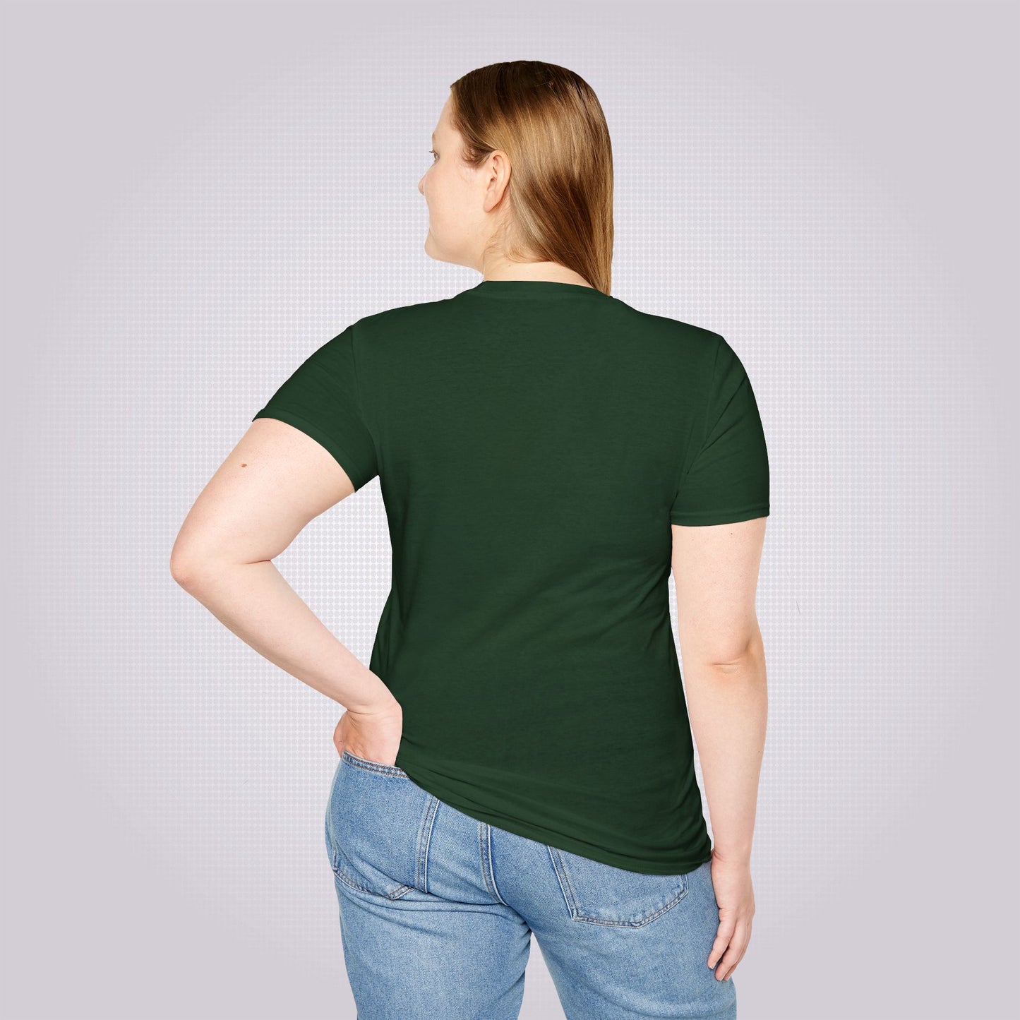 Young female with her back to the camera demonstrates the reverse side of the forest green t shirt with a pair of jeans