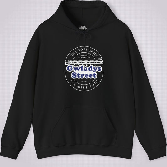 Black hoodie on a light grey patterned background the artwork shows an illustration of the Gwladys street stand with the words 'The Soft Spot Down At Goodison' written above it, and below it reads 'Gwladys Street I'll Miss You'