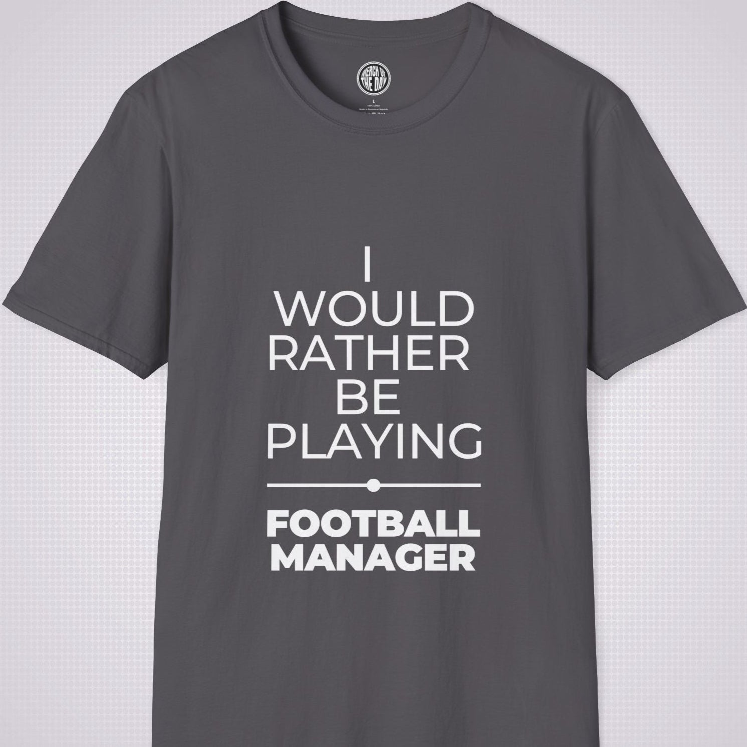 Charcoal t shirt on a light grey patterned backdrop with text on the shirt saying I would rather be playing football manager