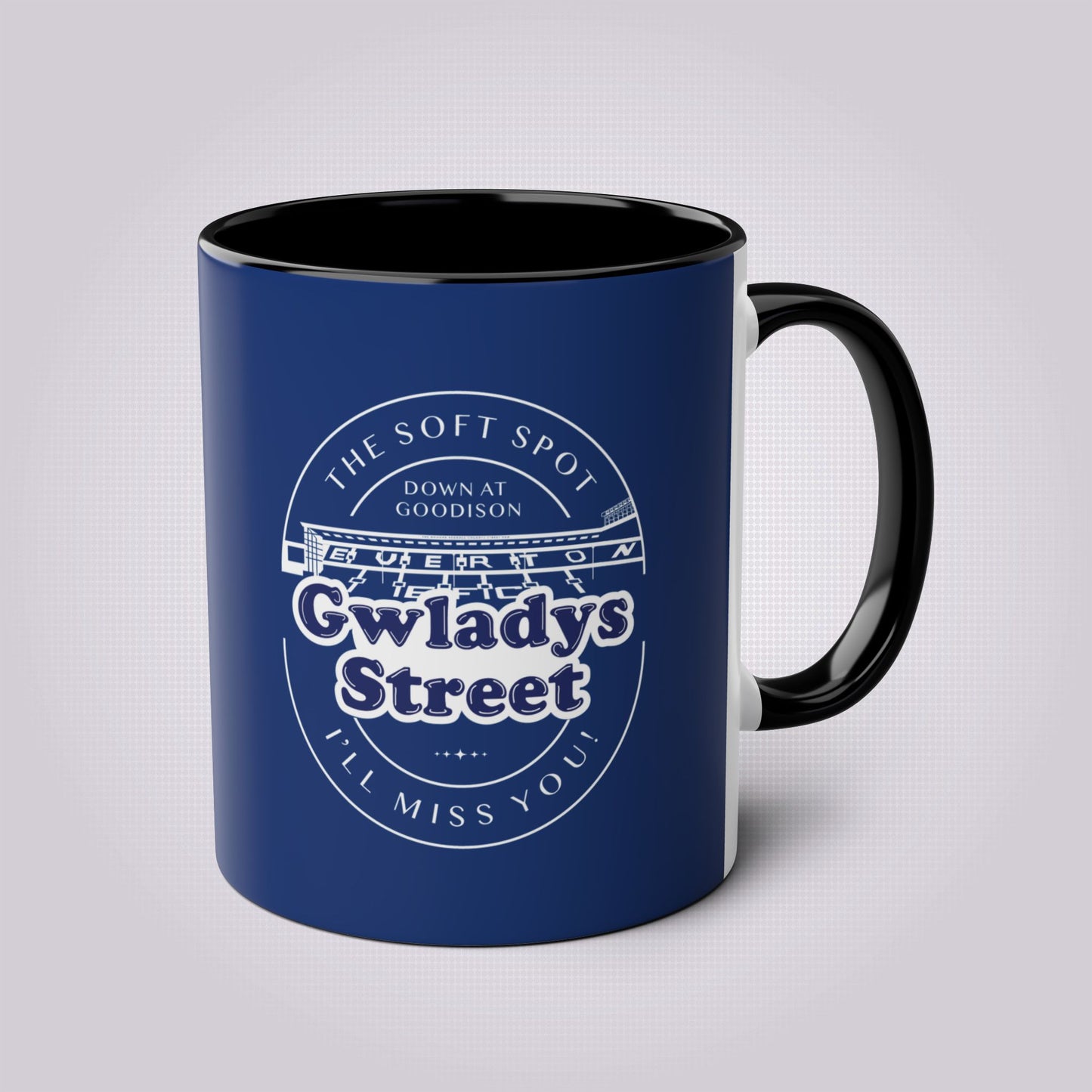 Navy blue mug with black handles and inners the handle is on the right hand side