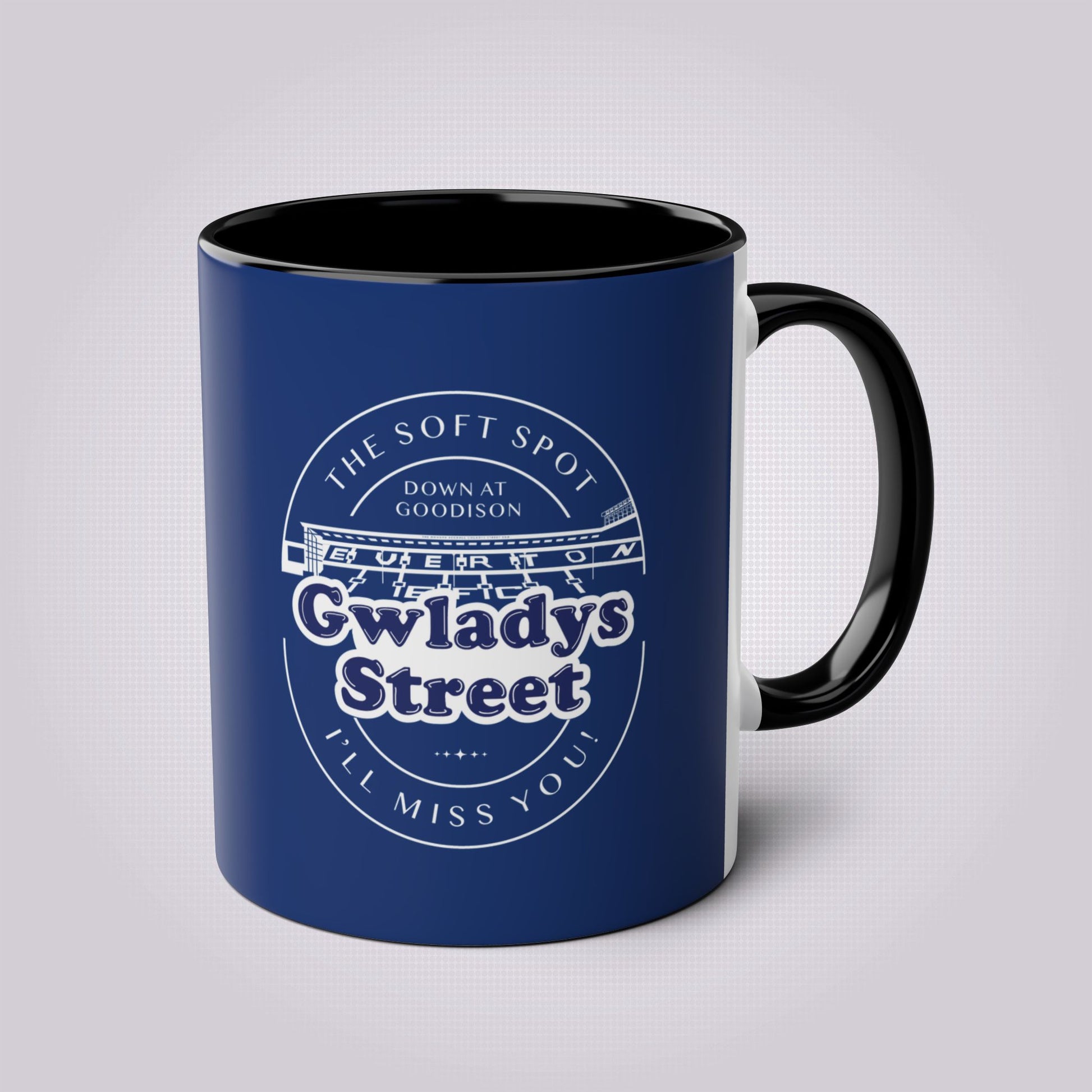 Navy blue mug with black handles and inners the handle is on the right hand side