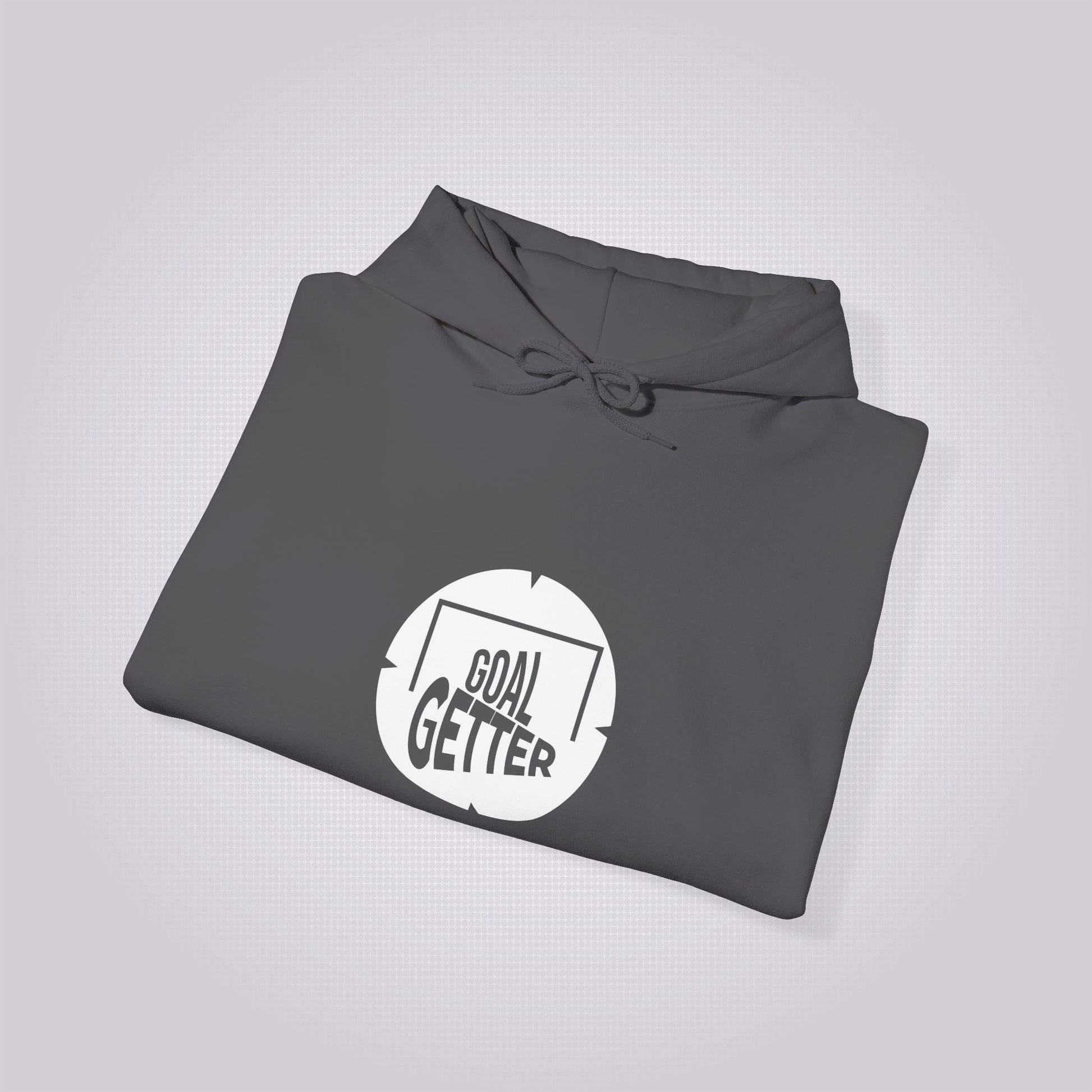 Charcoal hoodie folded up and placed at a slight right angle
