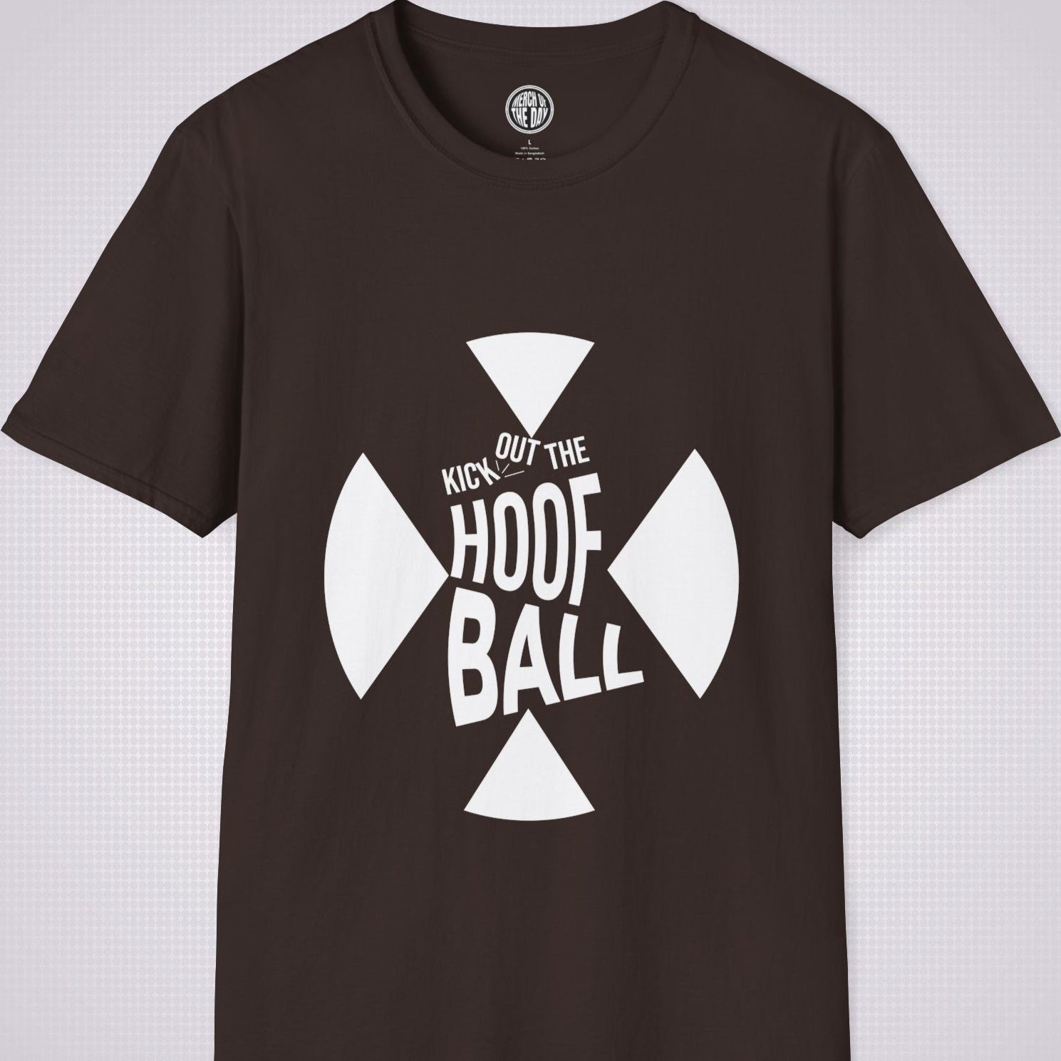 Brownt shirt on a light grey dotted background. The t shirt has a graphic of a giant X within that are the words 'Kick Out The Hoof Ball' 